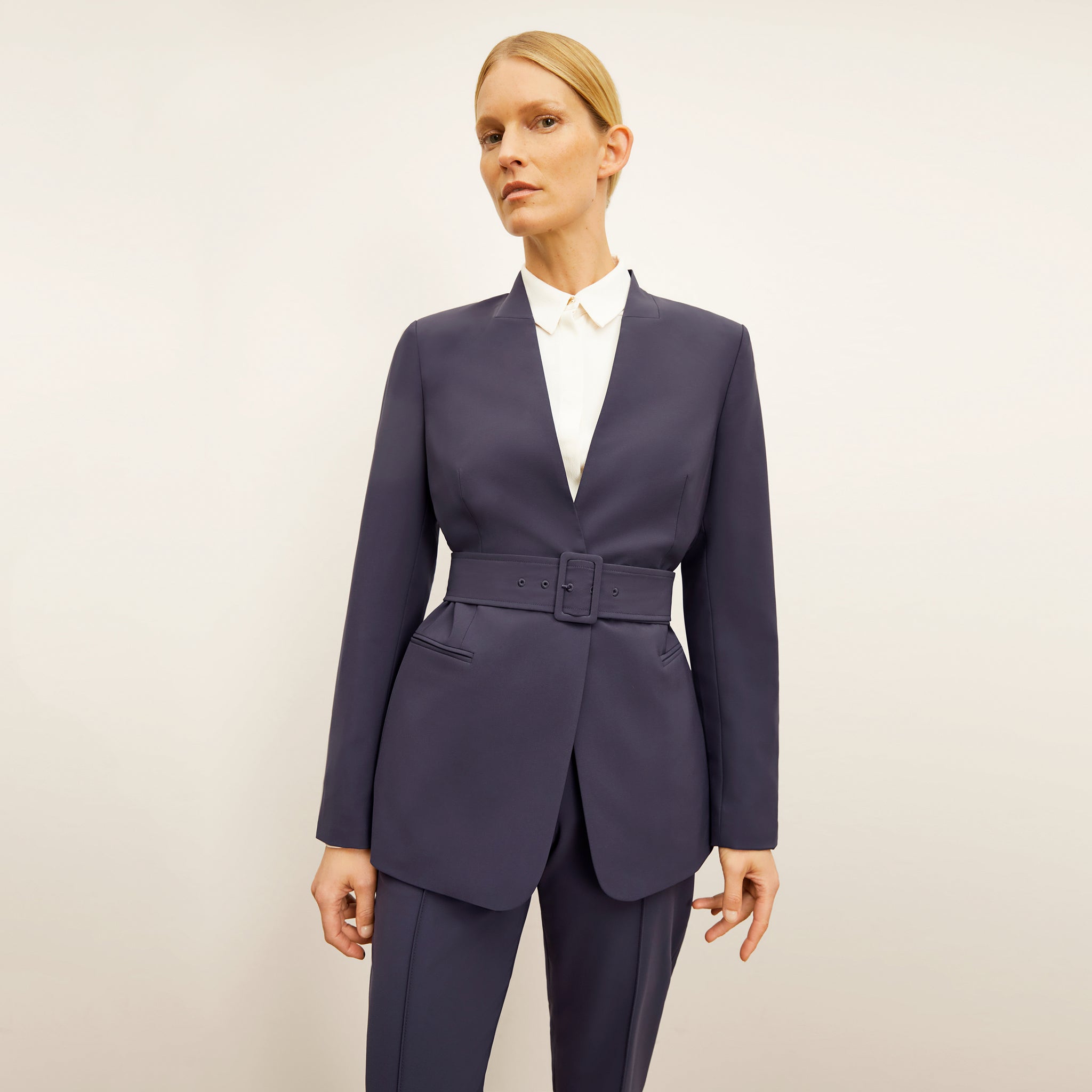 Front image of a woman wearing the Twidwell Blazer 