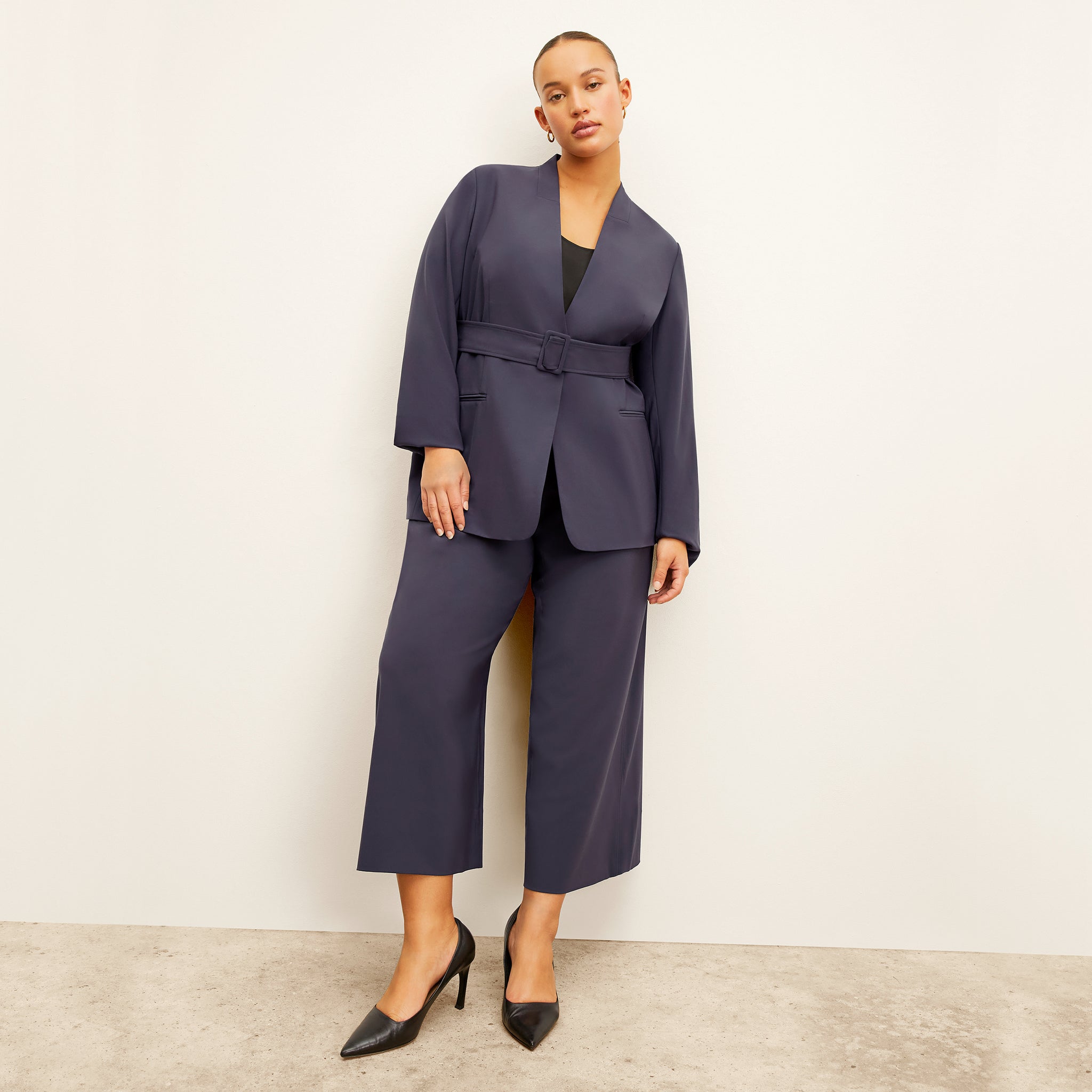 Front image of a woman wearing the Twidwell Blazer