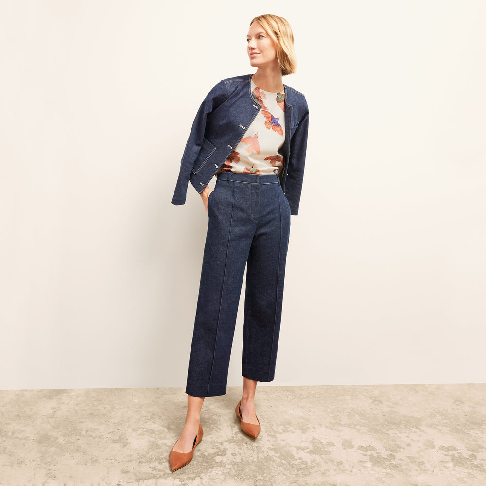 front image of a woman wearing the christy pant in dark wash