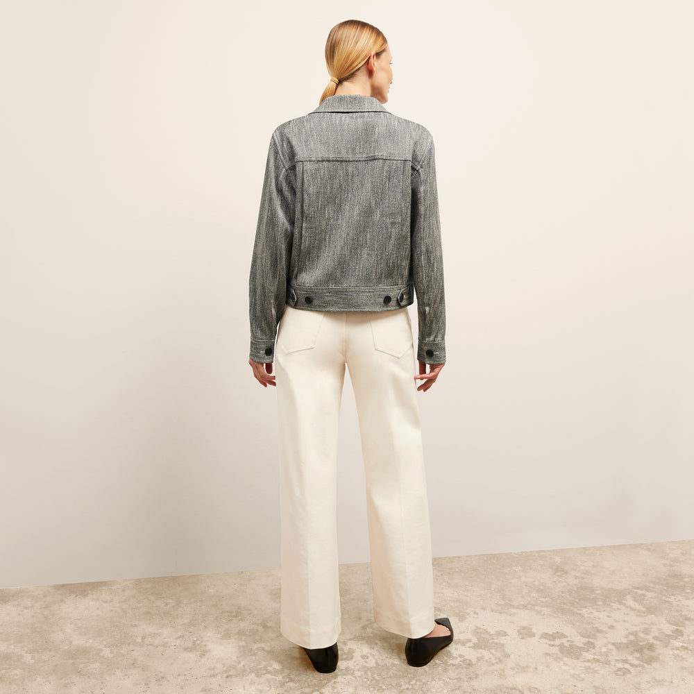 back image of a woman wearing the rhoda jacket in black/ivory