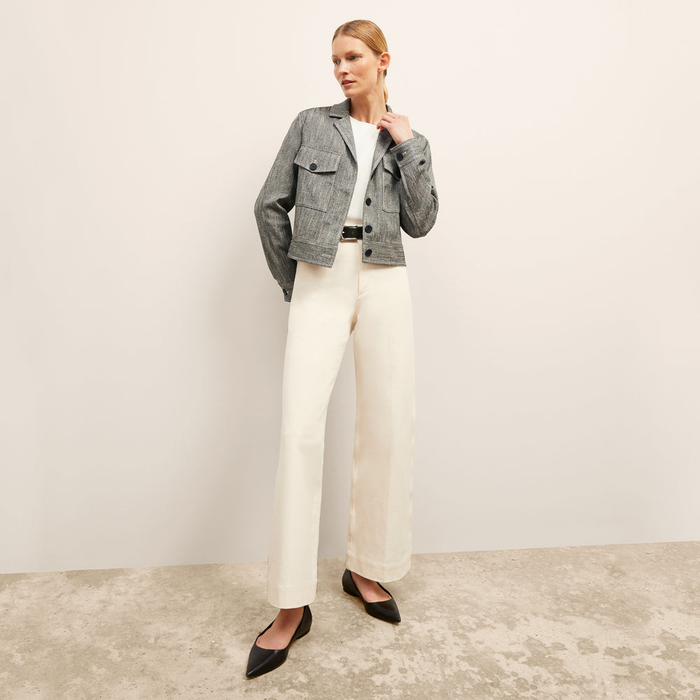 front image of a woman wearing the rhoda jacket in black/ivory