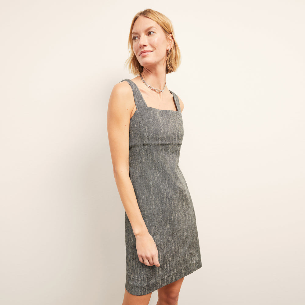 front image of a woman wearing the jennifer dress in black/ivory