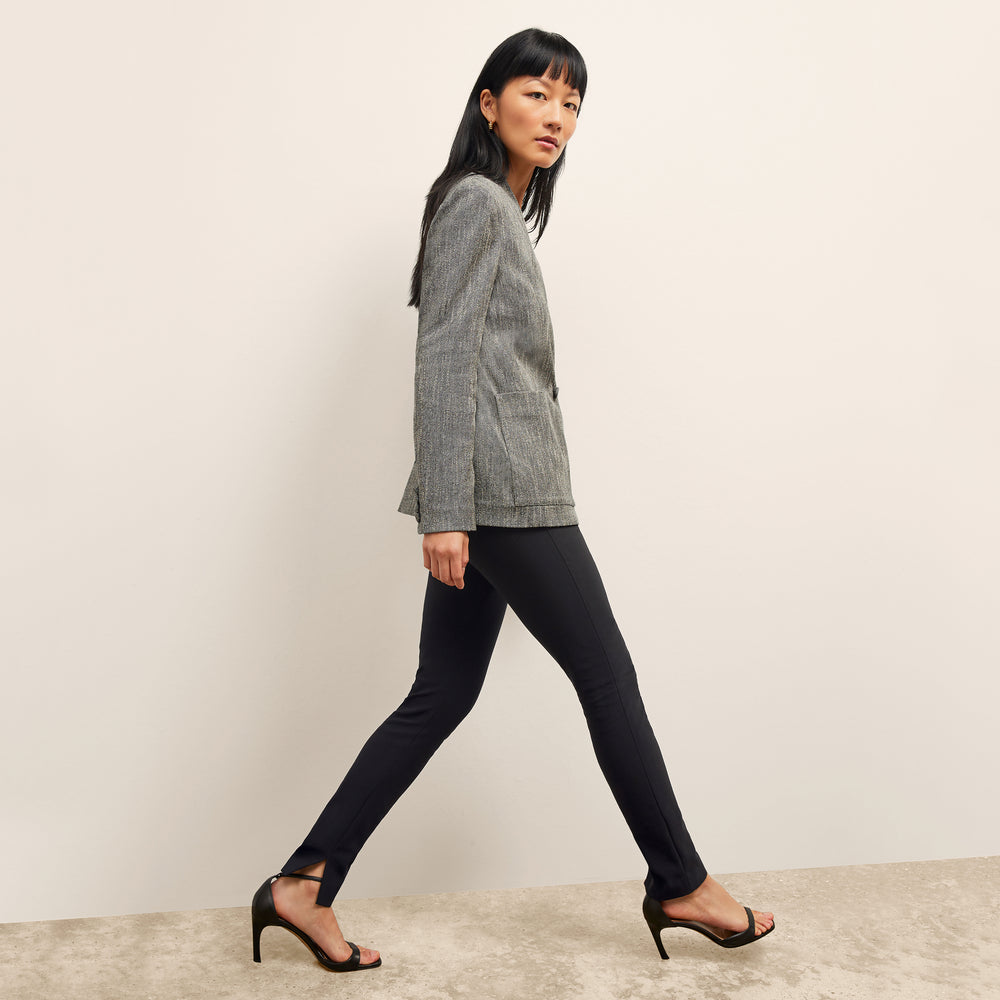 side image of a woman wearing the janette jacket in black/ivory