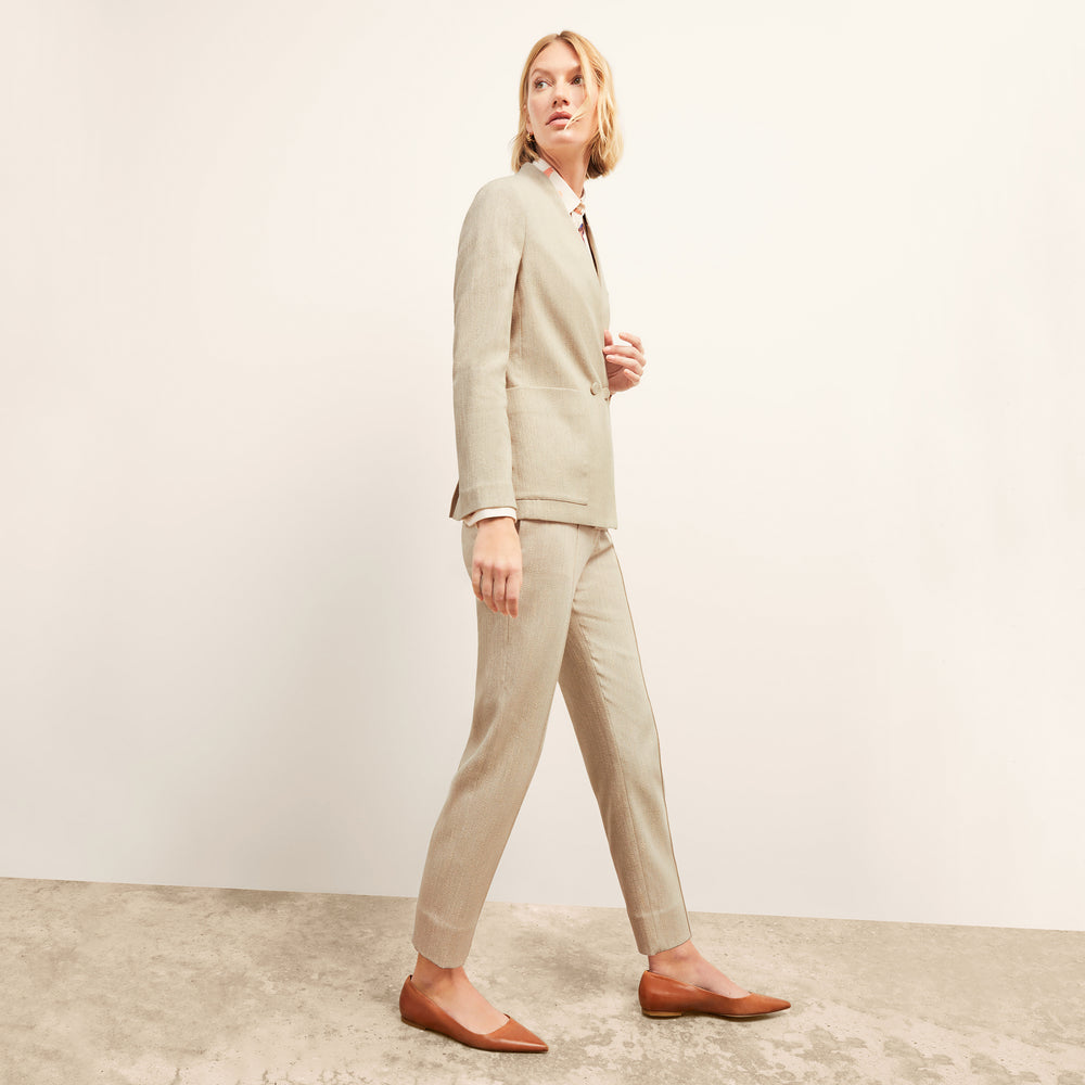 front image of a woman wearing the pearl pant in ivory