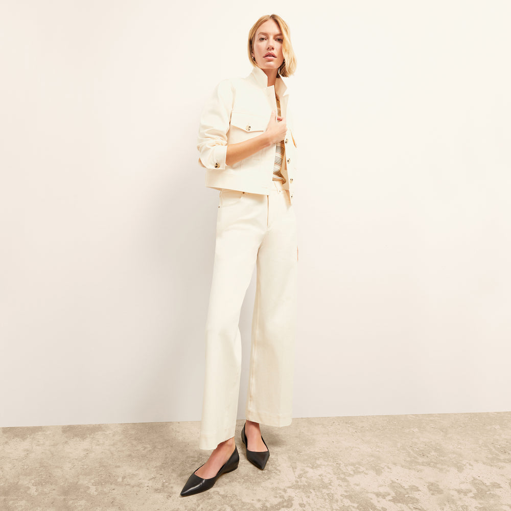front image of a woman wearing the rhoda jacket in tusk