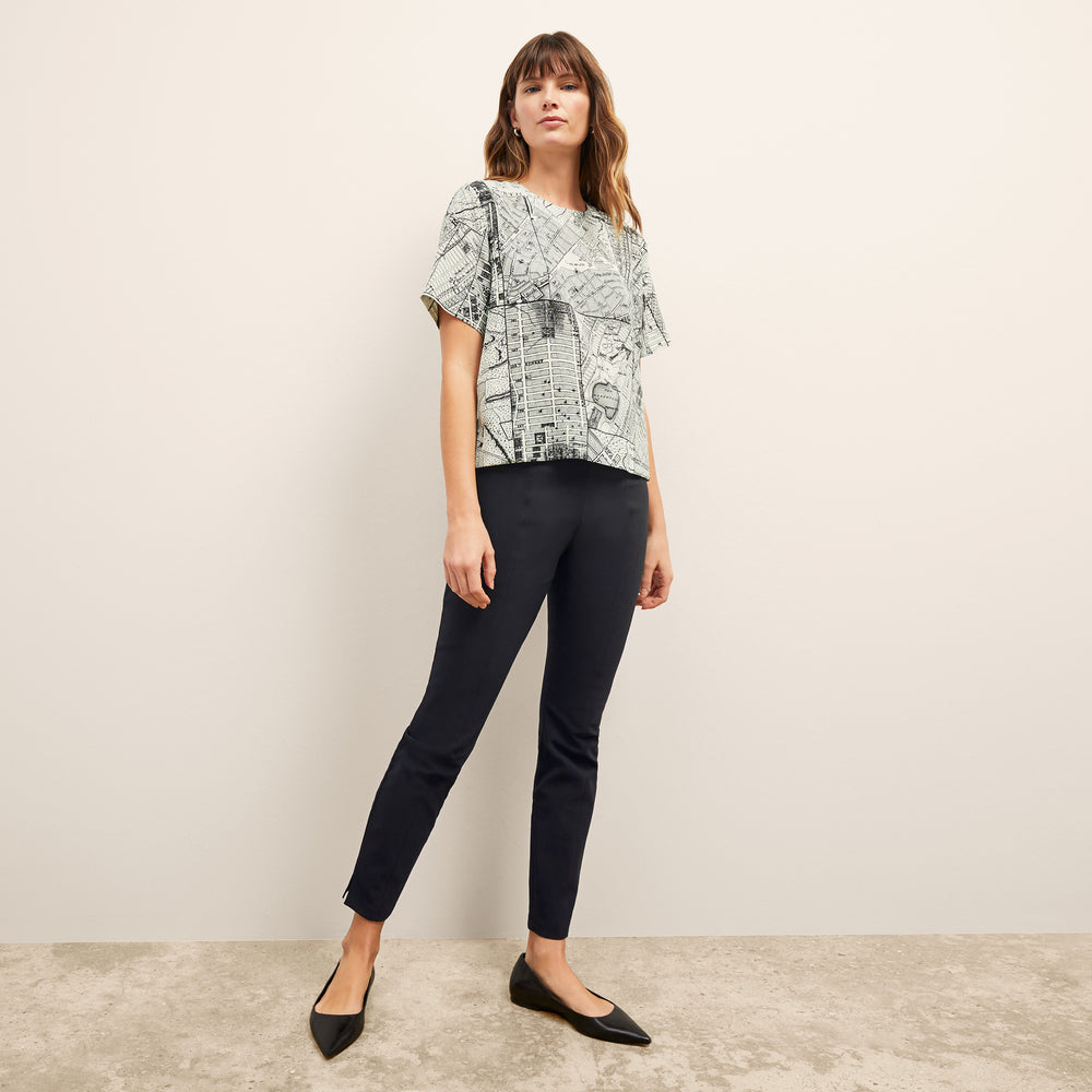 Front image of a woman wearing the Foster Skinny Pant in Black