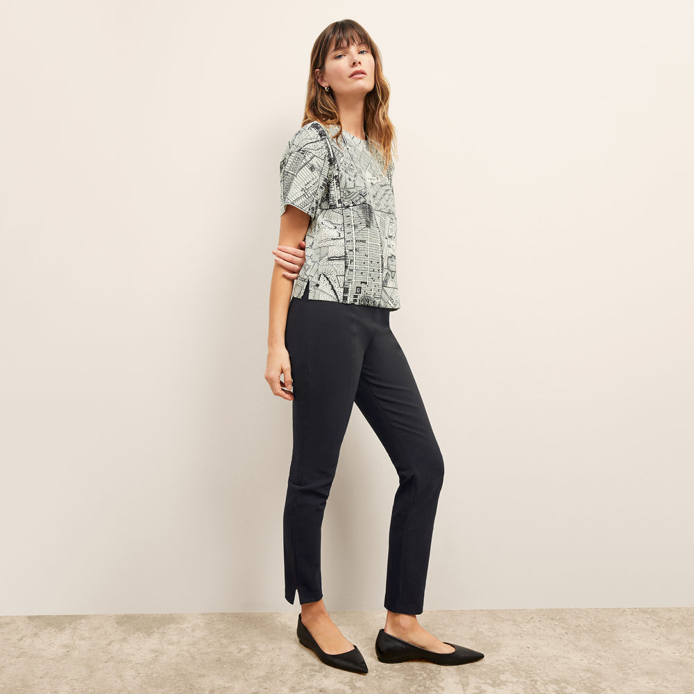 Front image of a woman wearing the Foster Skinny Pant in Black