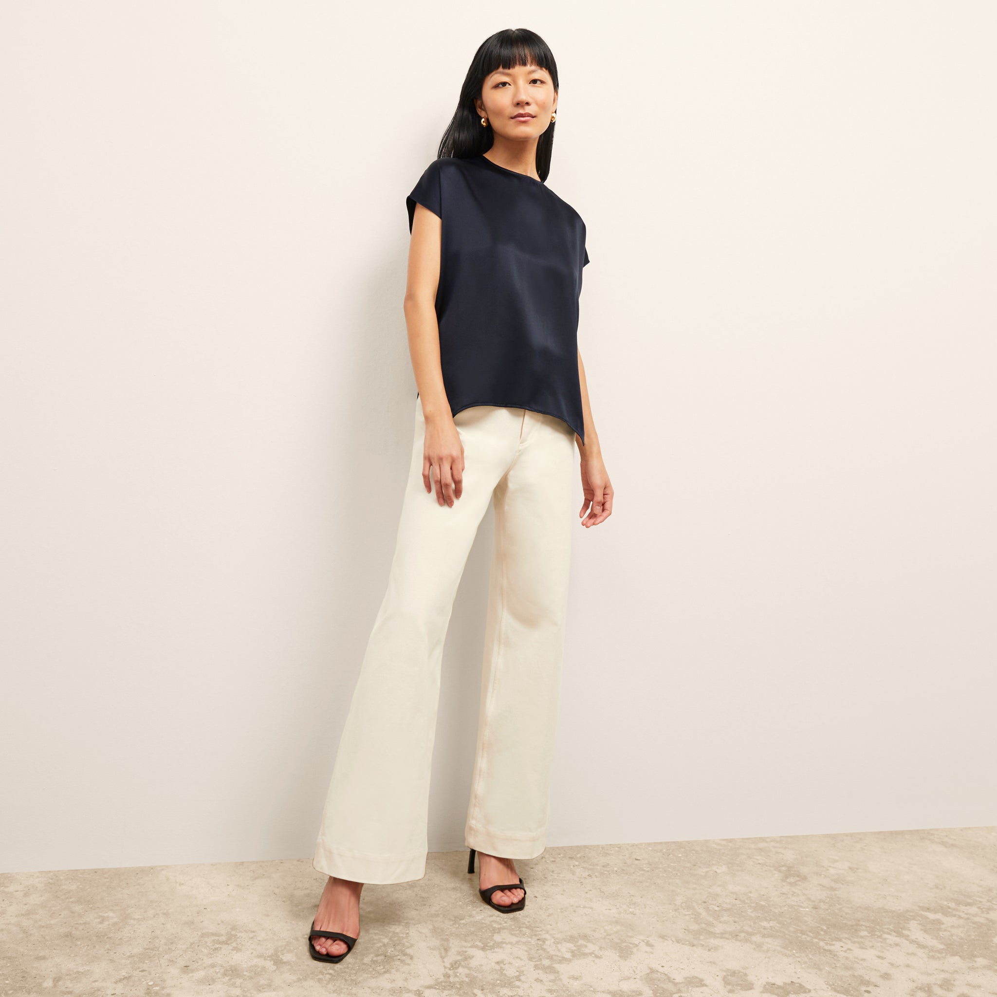 Front image of a woman wearing the Didion Top in Galaxy Blue 