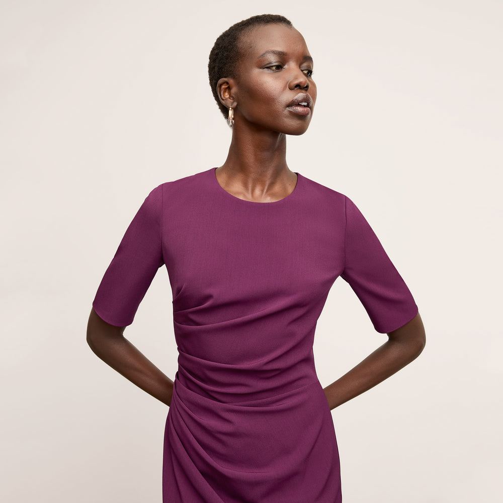 front image of a woman wearing the ciela dress in plumberry