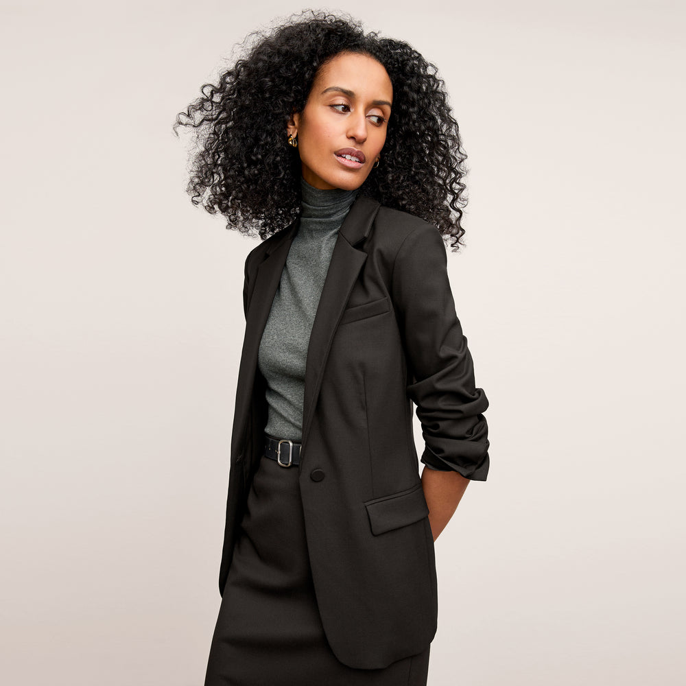 Front image of woman wearing the Jett Tank in Charcoal