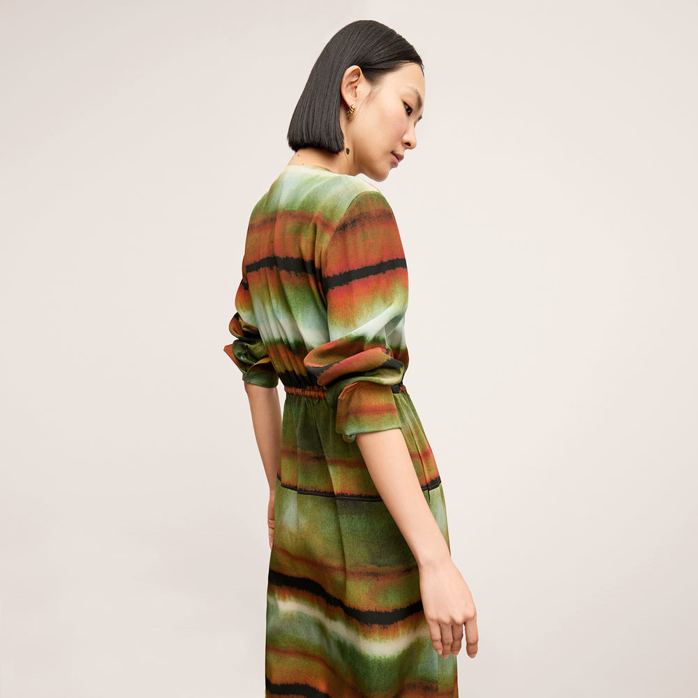 Back image of a woman wearing the Deana dress in Faded Print