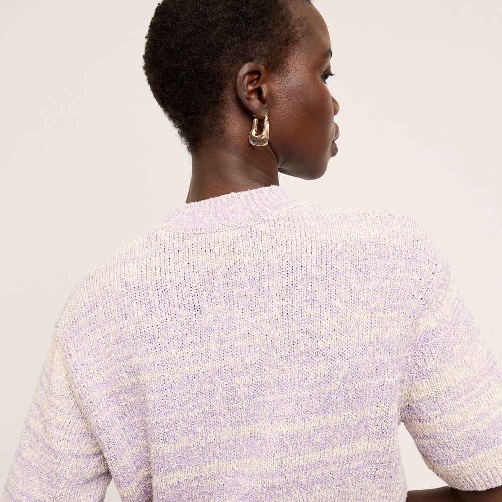 back image of a woman wearing the alexis top in lavender