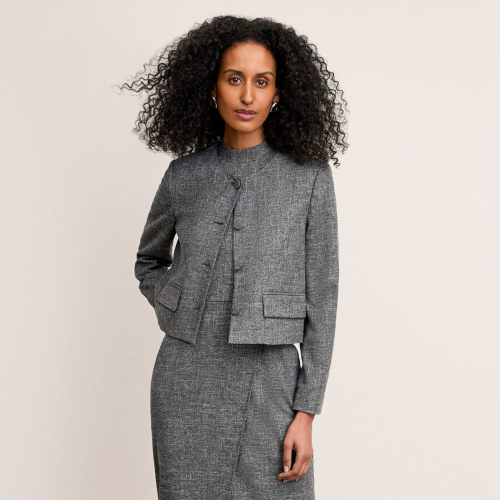 front image of a woman wearing the aniya jacket in black/white