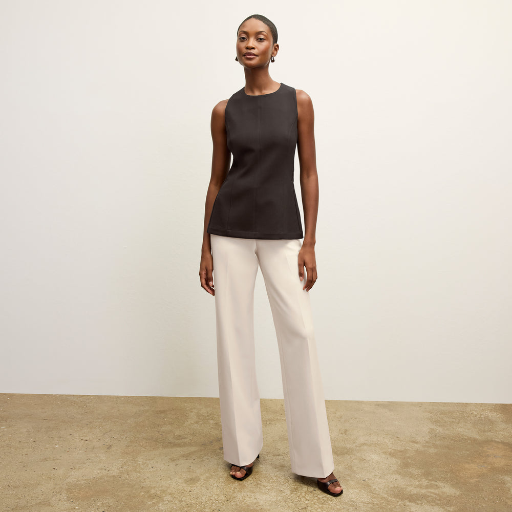 front image of a woman wearing the tinsley pant ivory