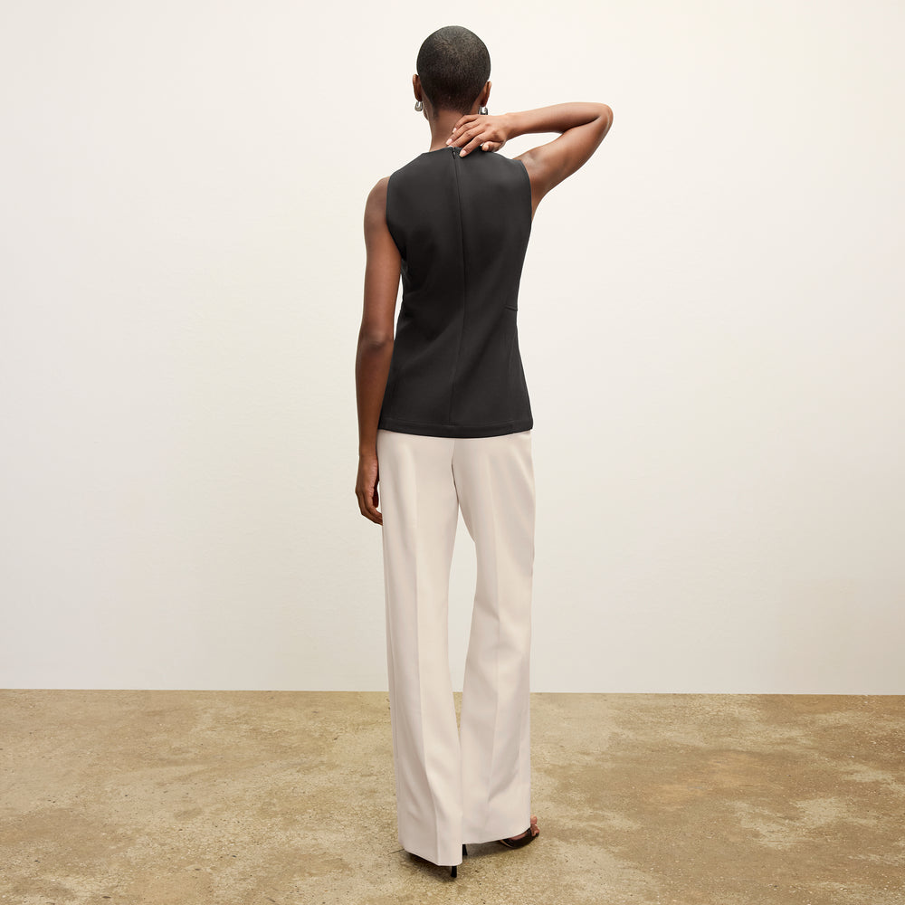 back image of a woman wearing the lucia top in black