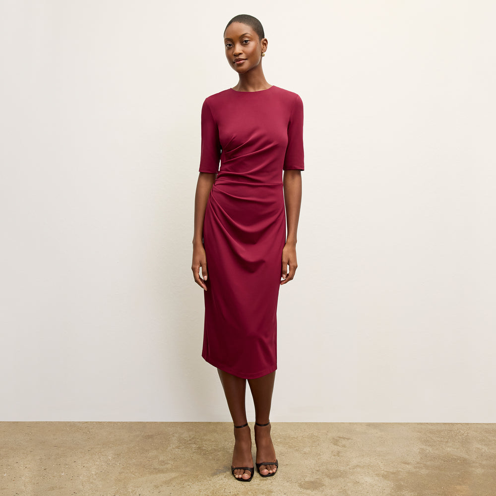 front image of a woman wearing the ciela dress in grenache