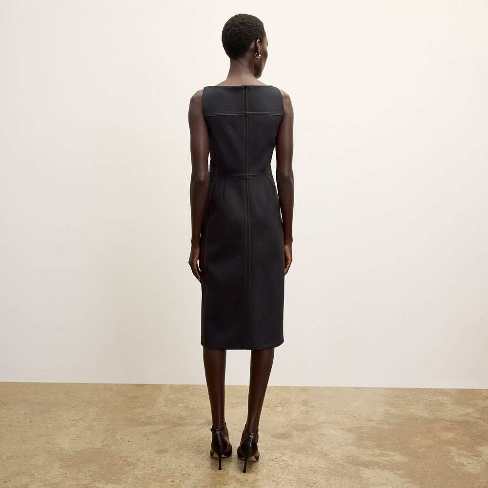 back image of a woman wearing the issa dress in black/light saddle