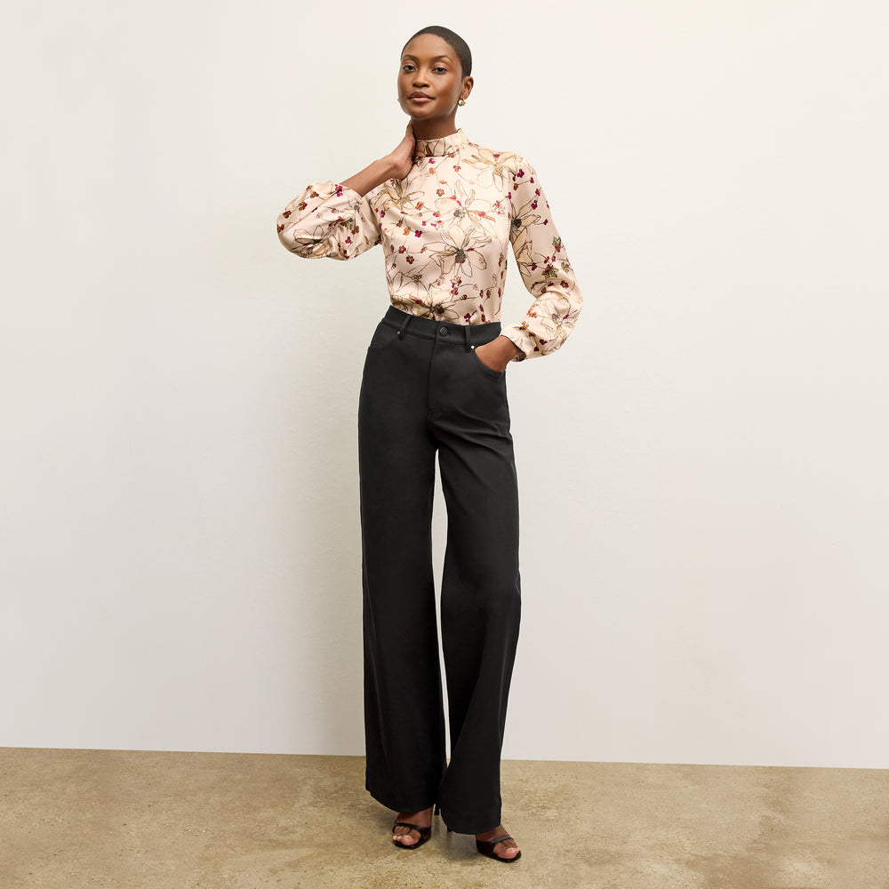 front image of a woman wearing the sohee top in botanical print