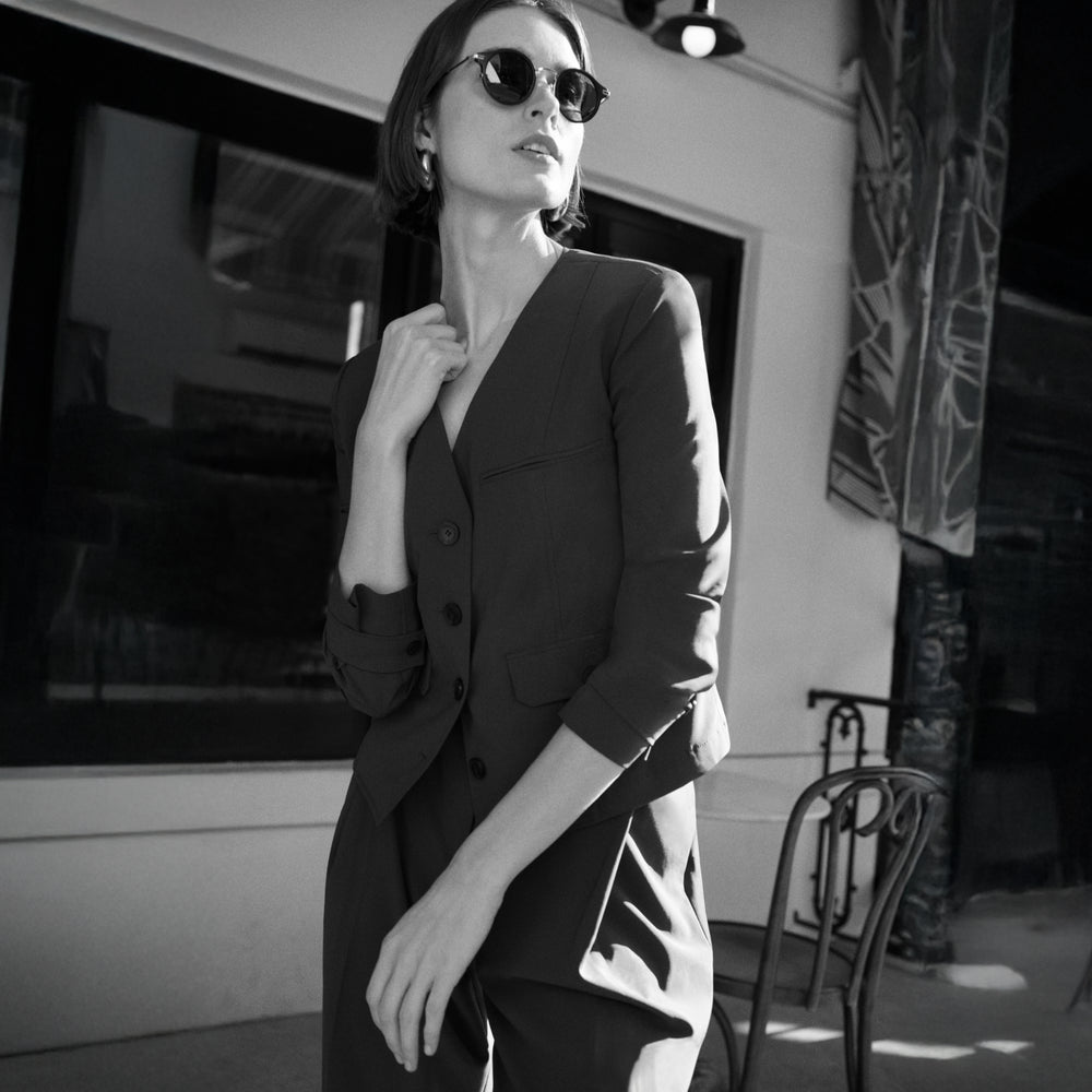 Front image of a woman wearing the Ayla Jacket in Olive