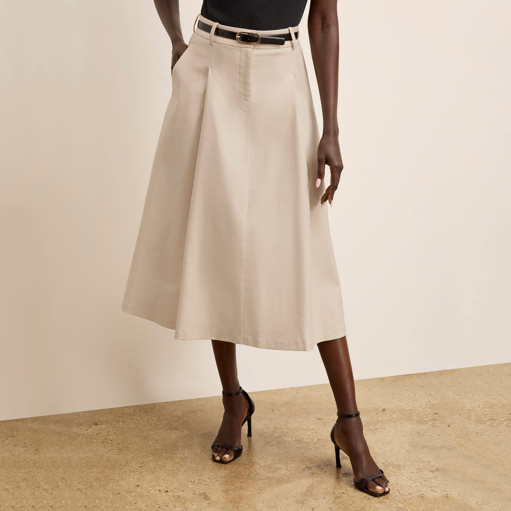 front image of a woman wearing the olia skirt in natural