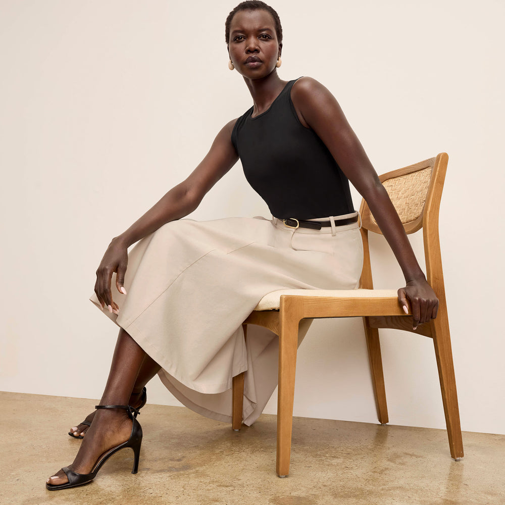 front image of a woman wearing the olia skirt in natural