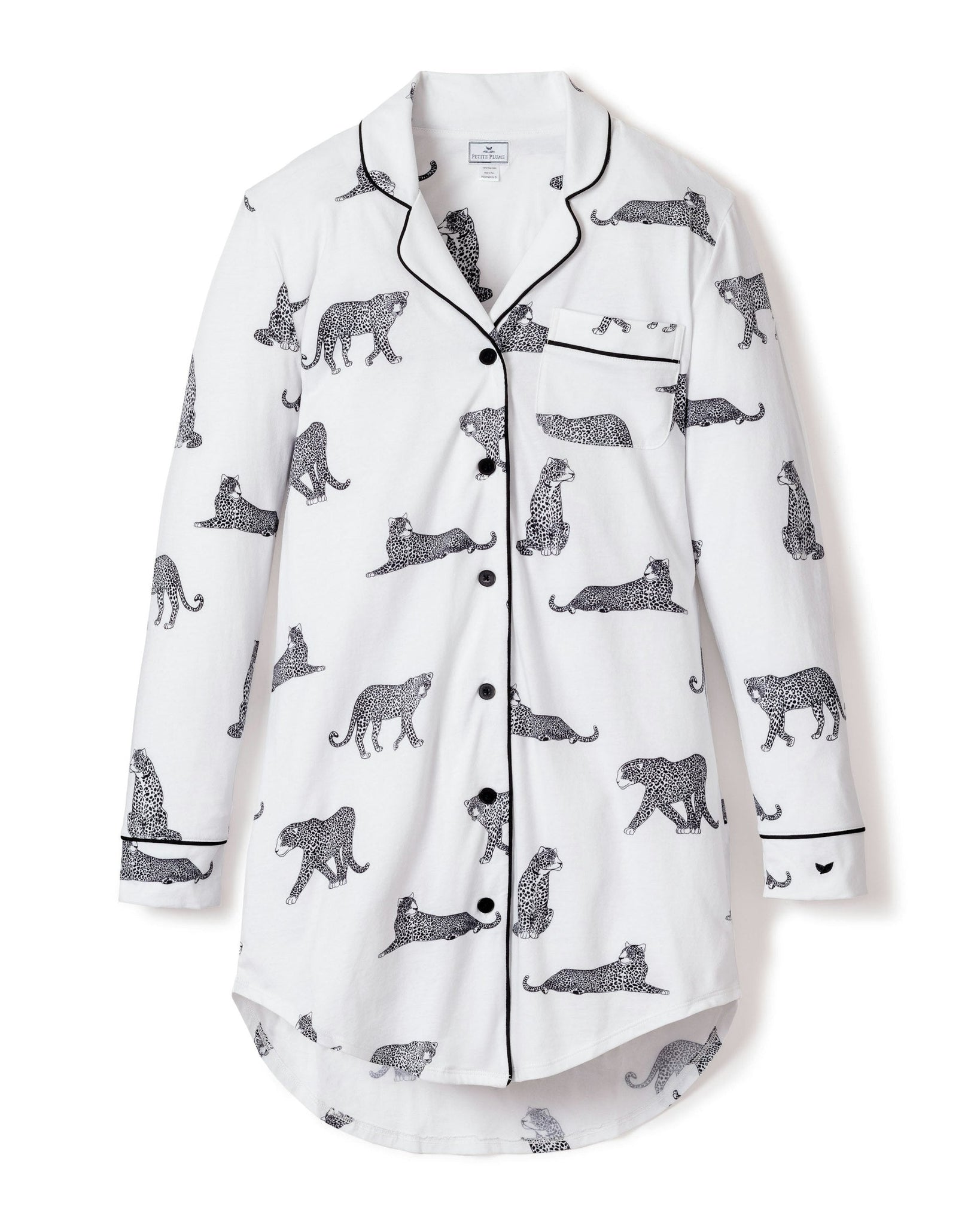 White pajama shirt with black animal pattern on a white background
