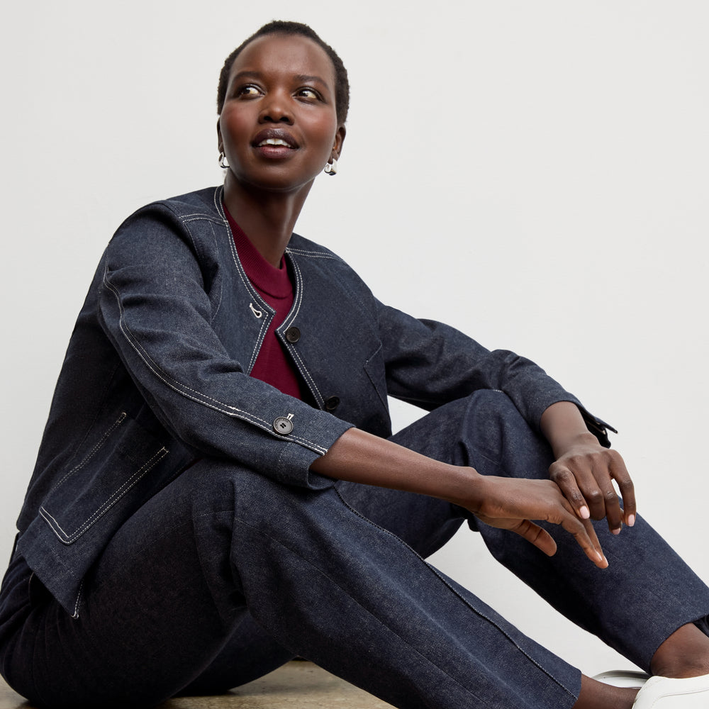 front image of a woman wearing the rowe pant in midnight wash
