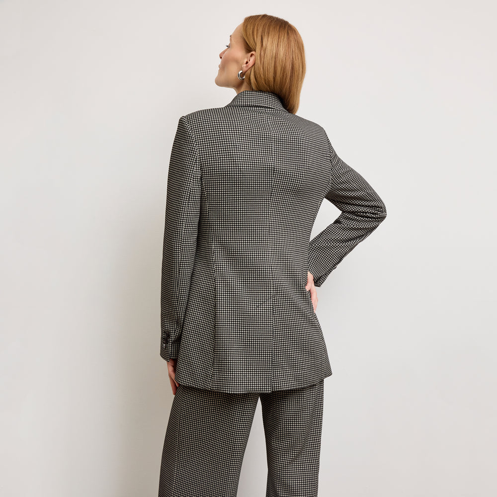 back image of a woman wearing the rossi blazer in classic check
