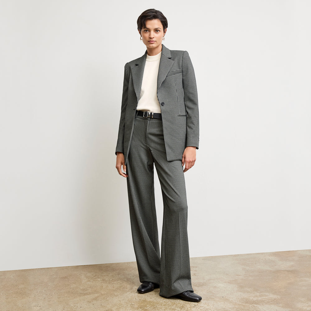 front image of a woman wearing the rossi blazer in classic check