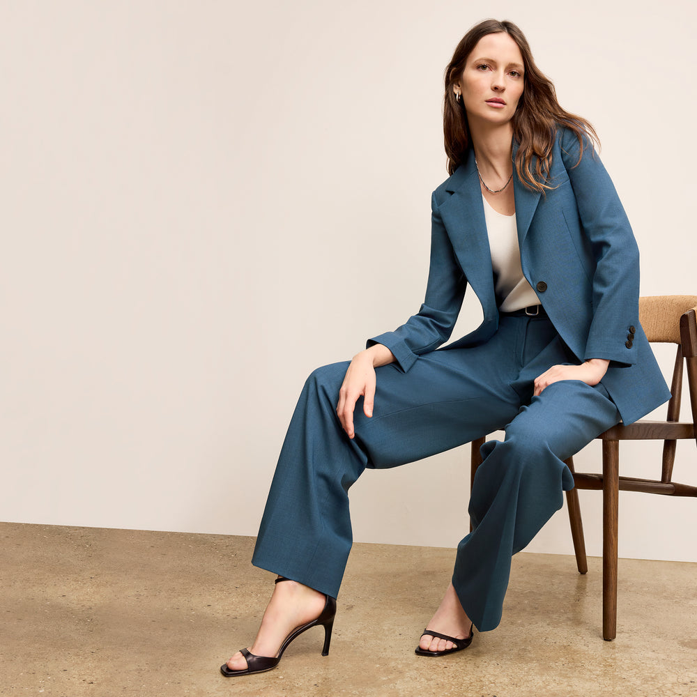 front image of a woman wearing the rossi jacket in bluebell
