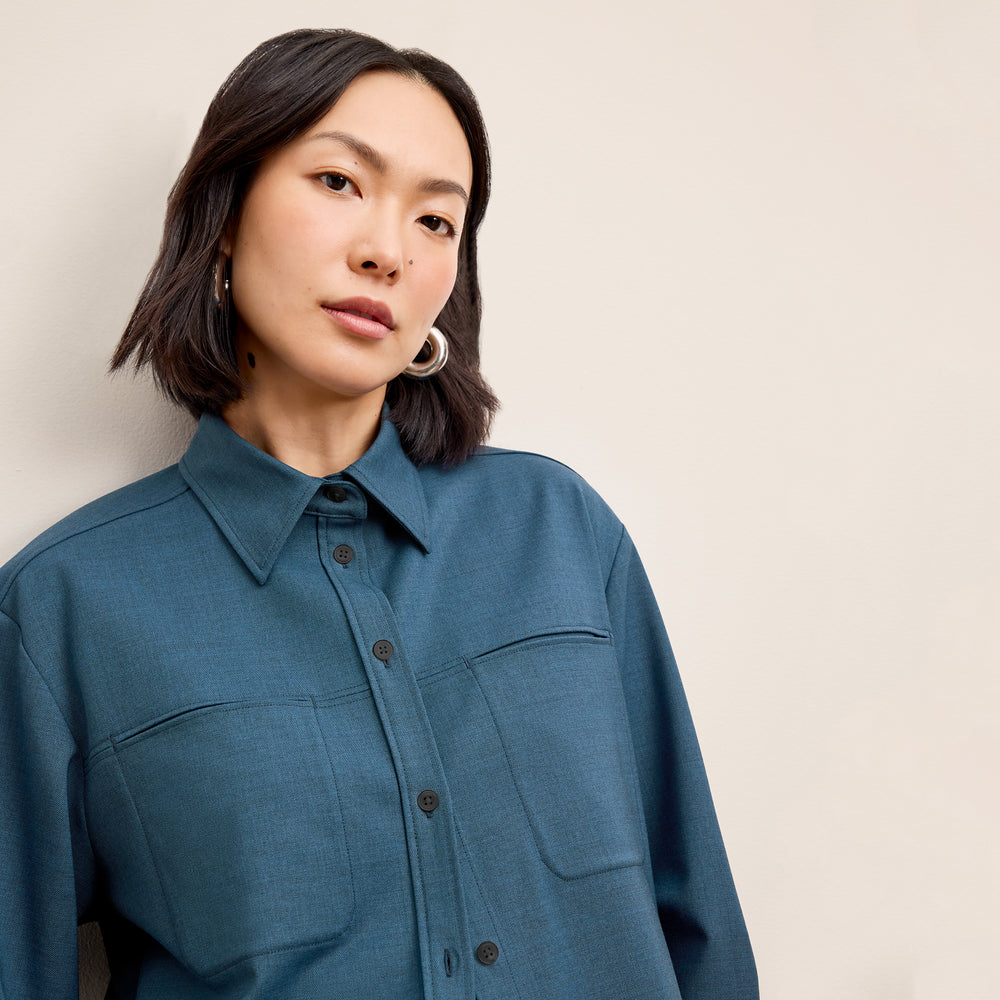 front image of a woman wearing the russell top in bluebell