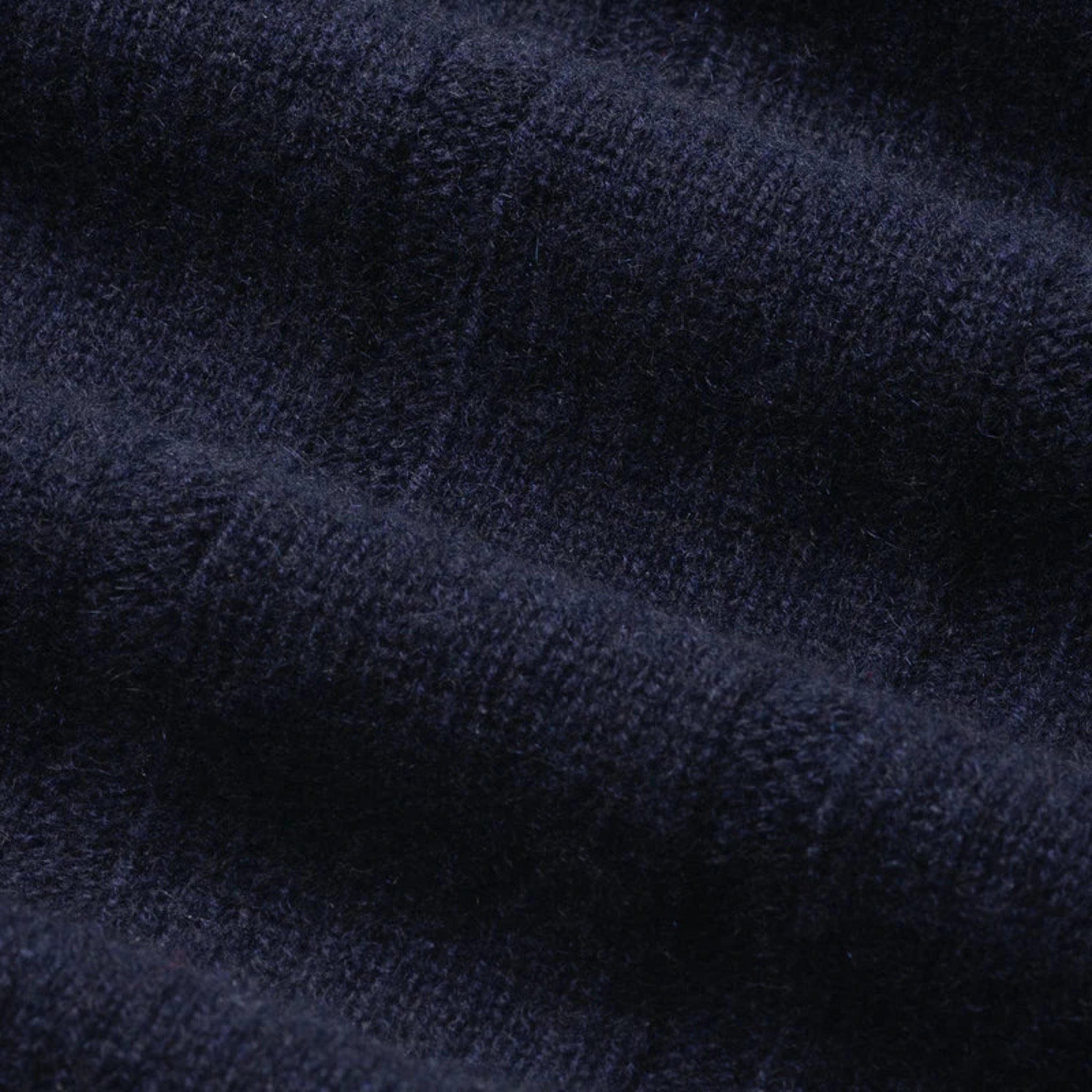 Close-up of dark blue fabric texture