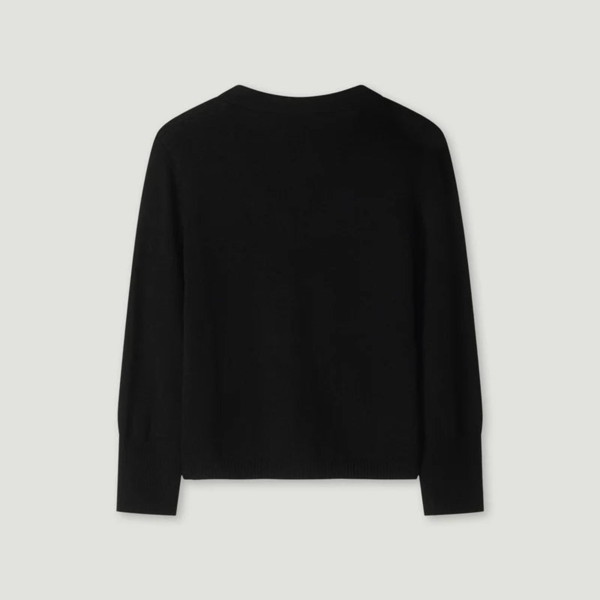 Black long-sleeve shirt on a light gray background