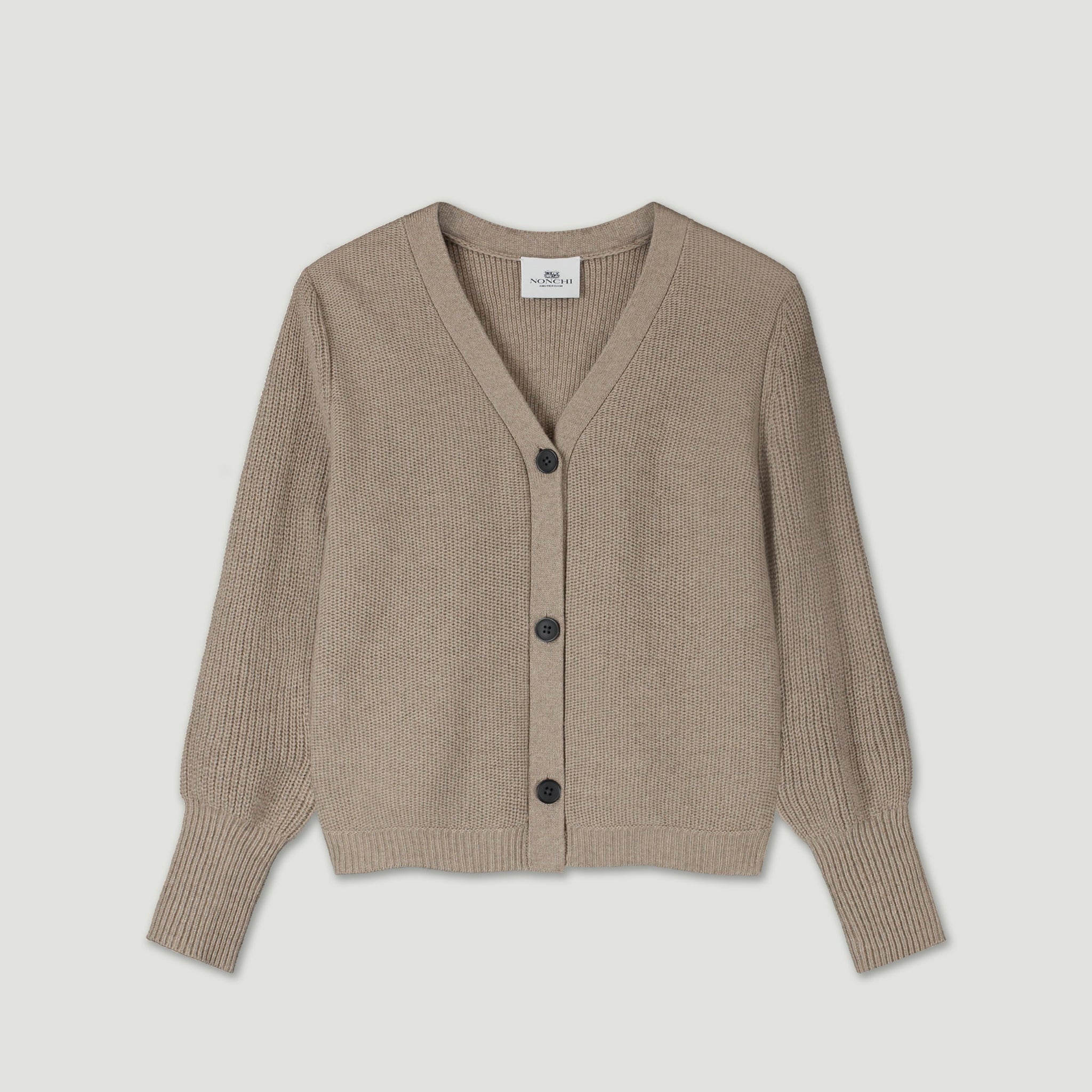 Beige cardigan with buttons on a light gray background 