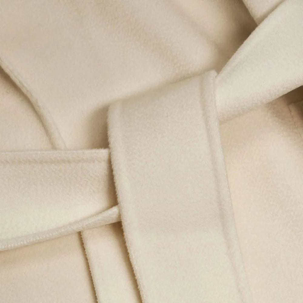 Close-up of a beige fabric with a belt detail