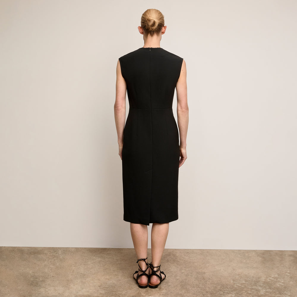 Back image of a woman wearing The Vienna Dress - Flex Suiting - Black