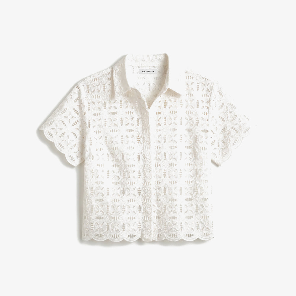 White lace blouse on a light beige background