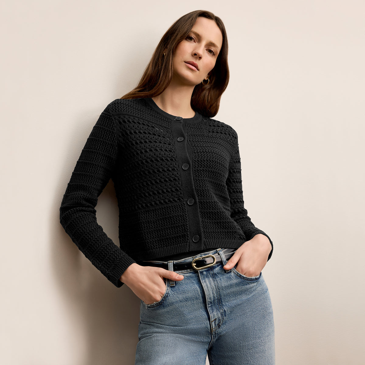 Woman wearing black cardigan