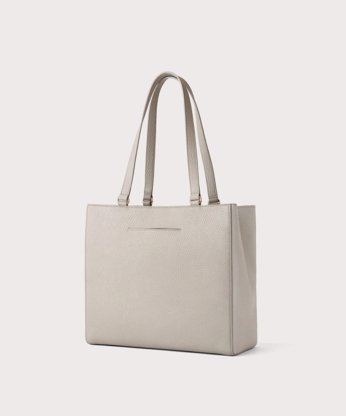 Beige tote bag on a light gray background