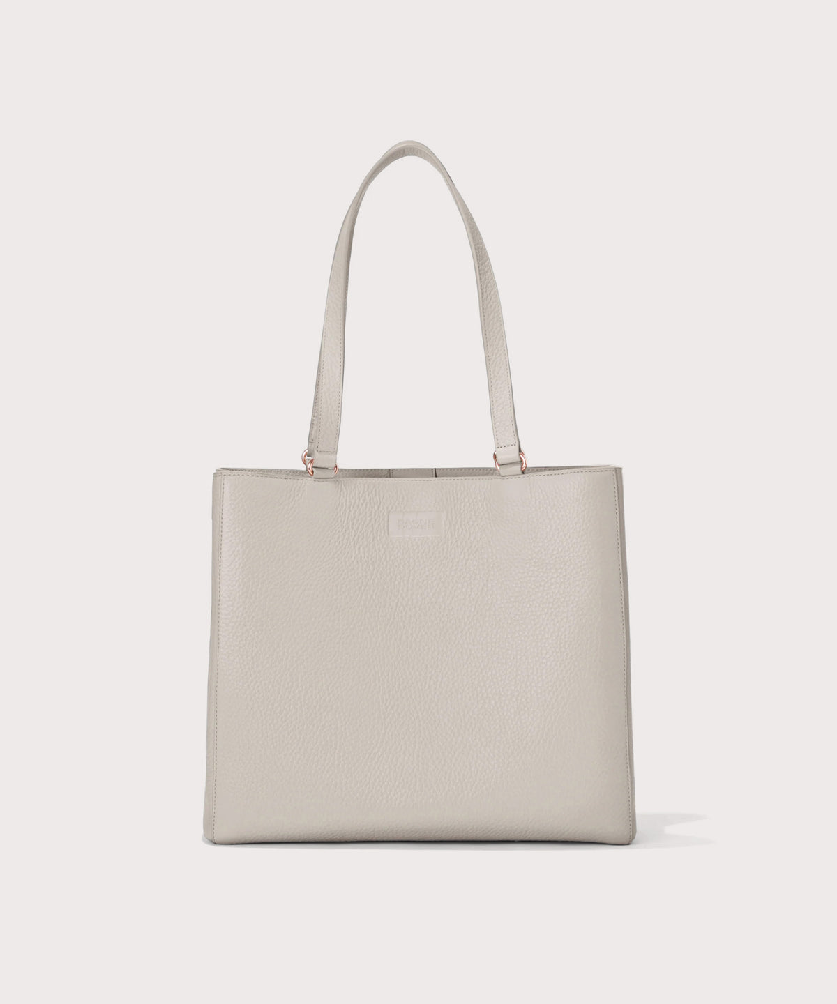 Beige tote bag on a light gray background 