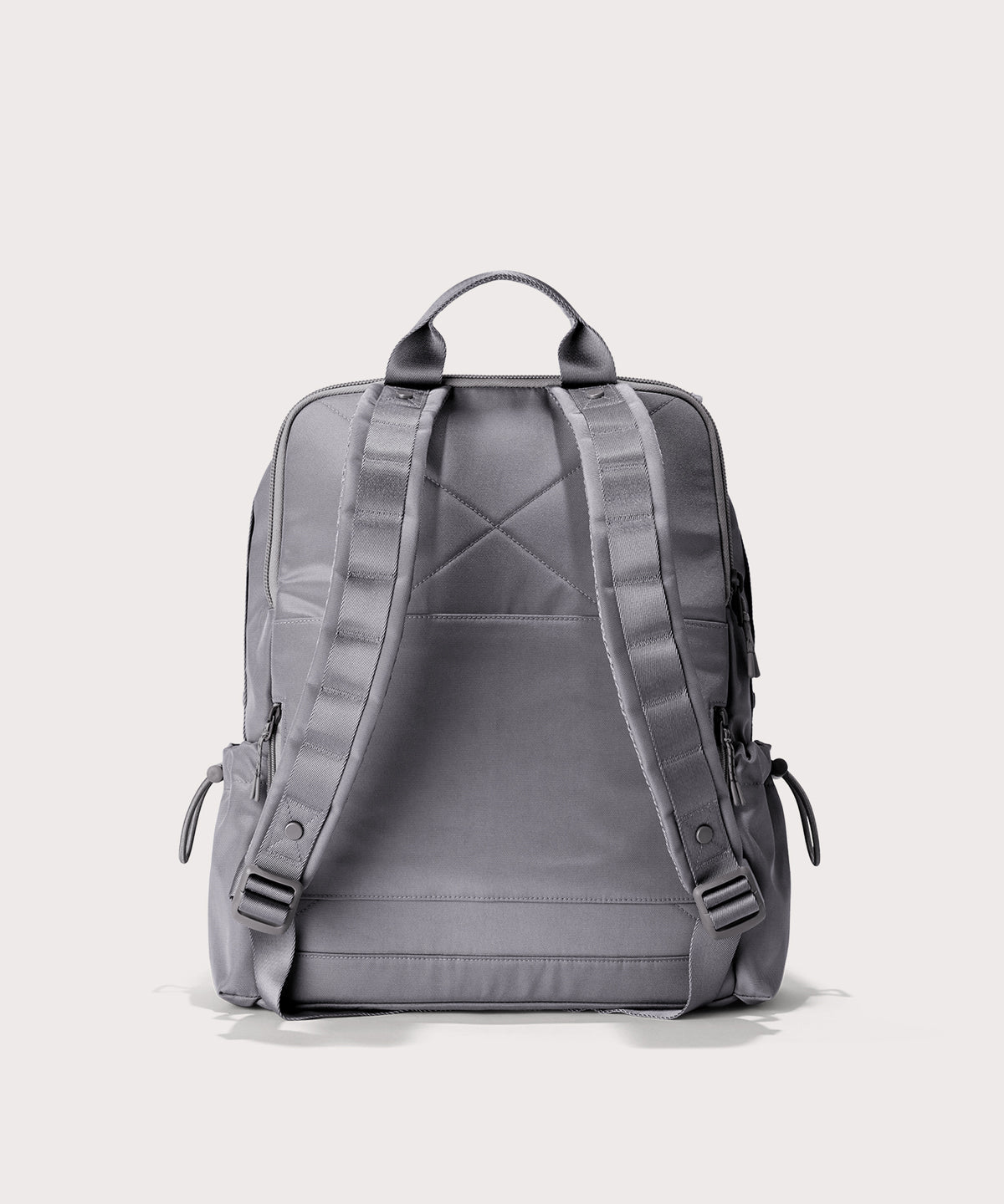 Gray backpack on a light gray background