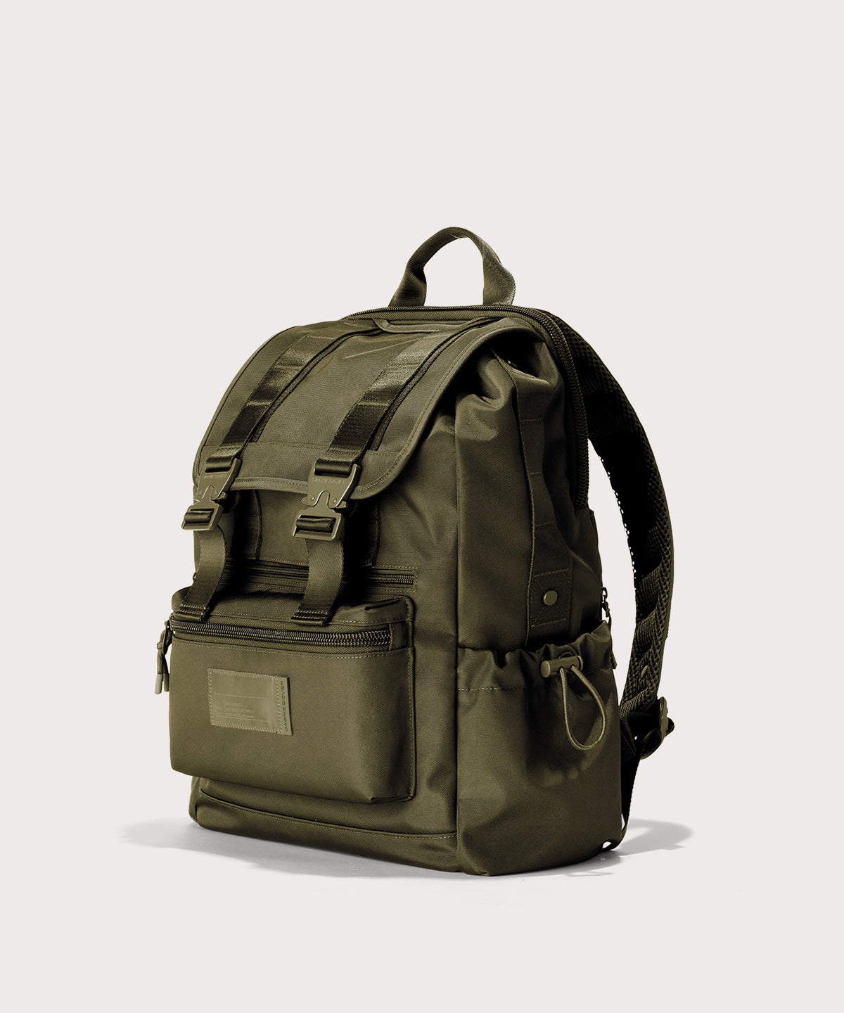 Green backpack on a light gray background
