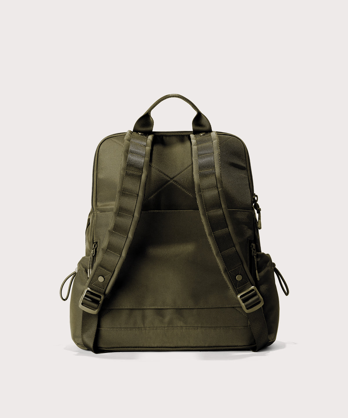 Green backpack on a light gray background
