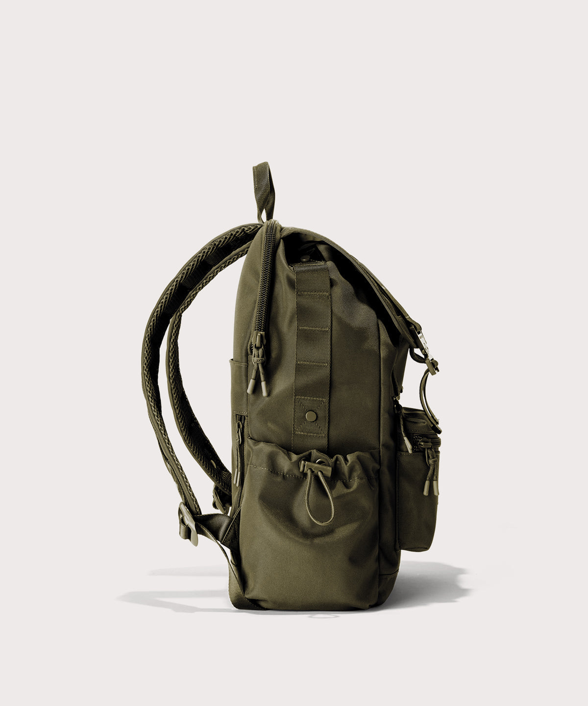 Green backpack on a light gray background