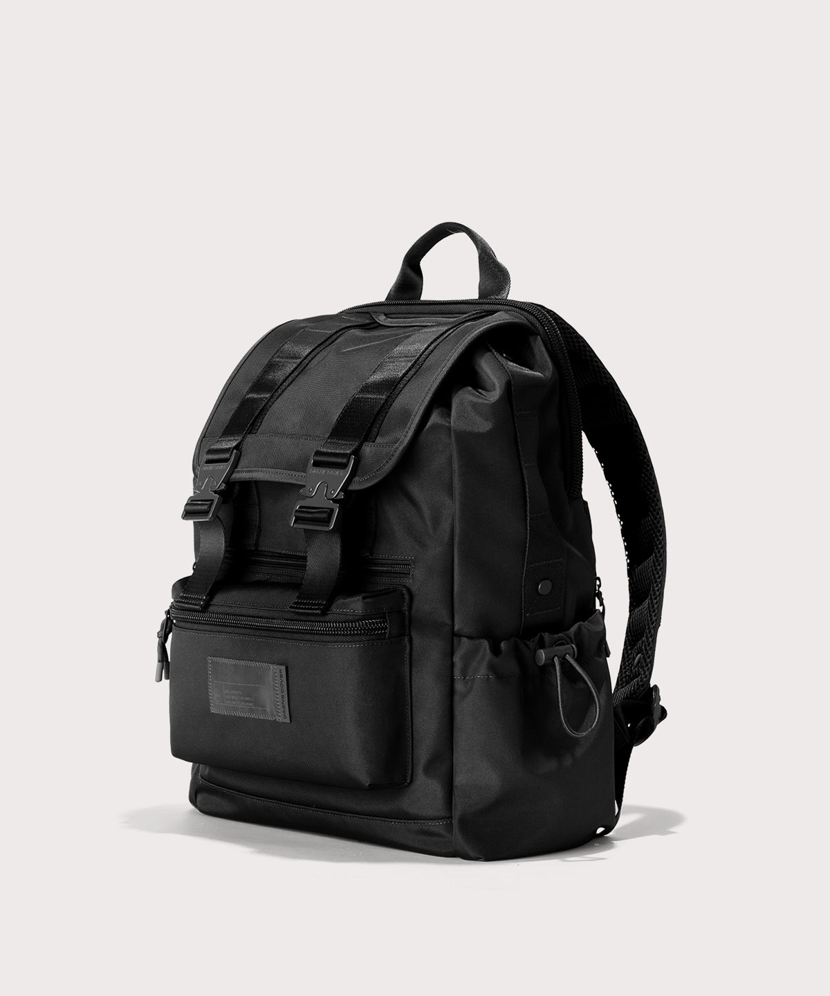 Black backpack on a light gray background