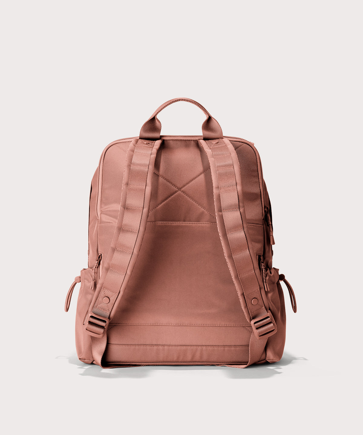 Pink backpack on a light gray background