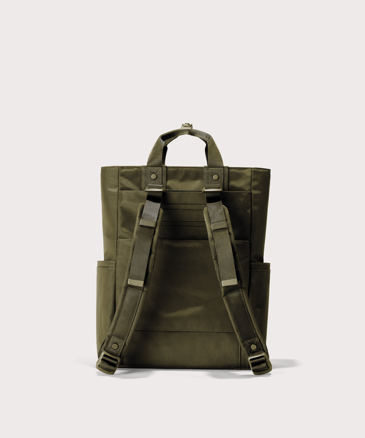 Green backpack on a light gray background