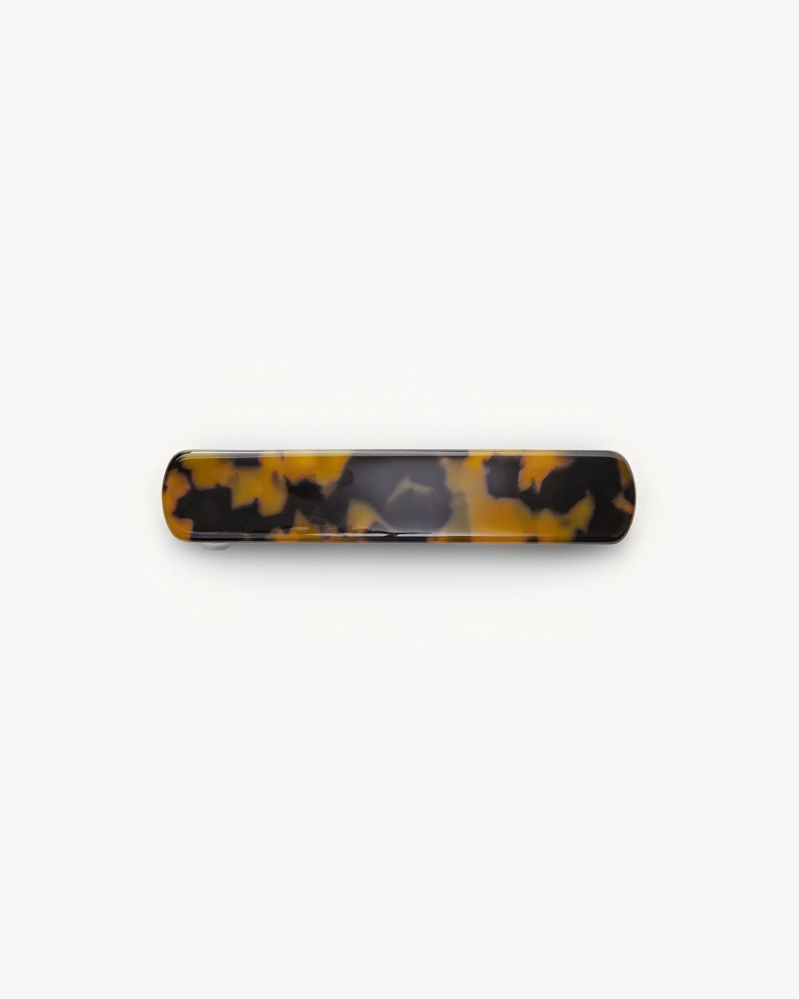 Tortoiseshell barrette on a white background