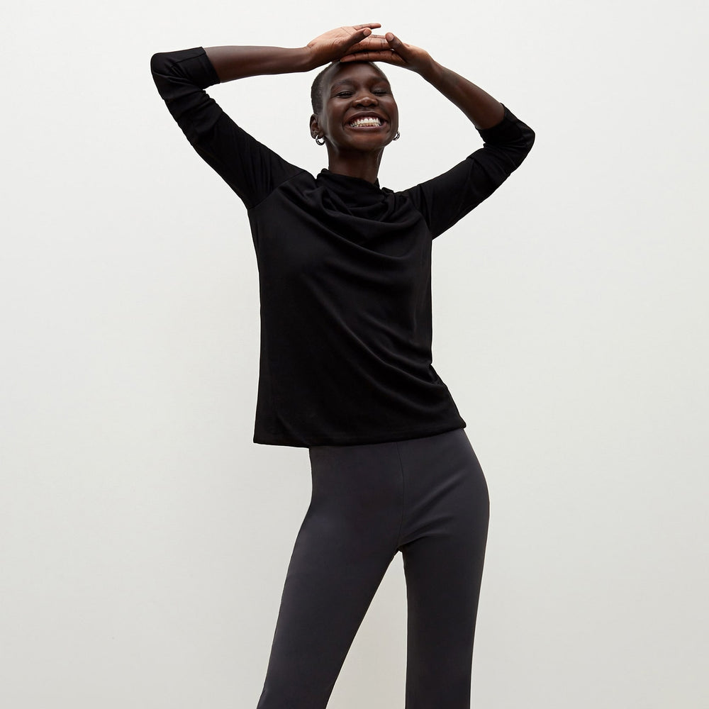 Front image of a woman standing wearing the Oshima pant in Monsoon