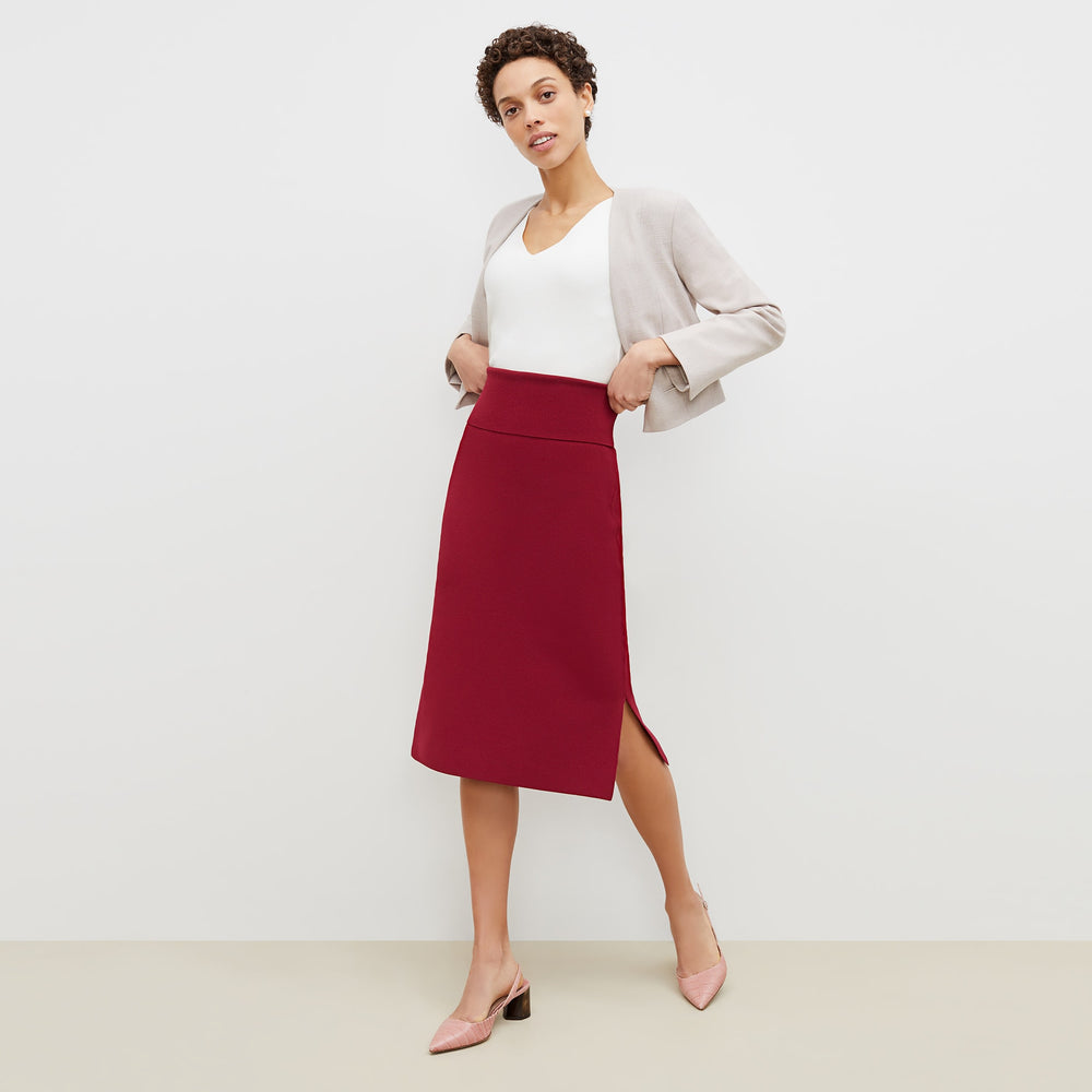 Front image of a woman standing wearing the harlem skirt in hibiscus
